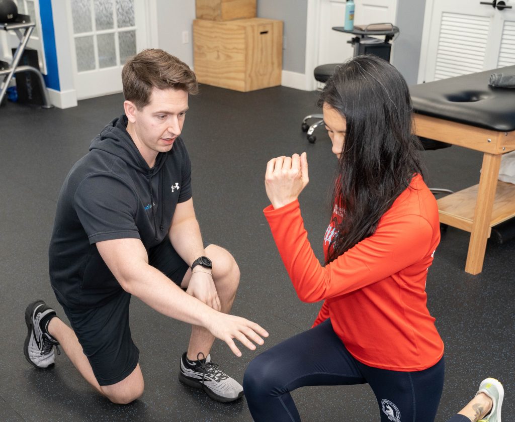 Client doing a lunging exercise during one on one physical therapy at Next Level Physical Therapy in Hamilton, NJ