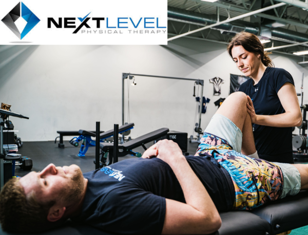 Physical therapist working on a patient who is lying down at Next Level Physical Therapy in Southampton, PA
