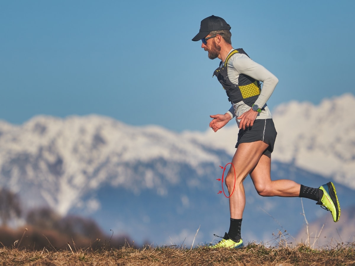 RUNNER MID-STRIDE WITH HIGHLIGHT ON KNEE AREA