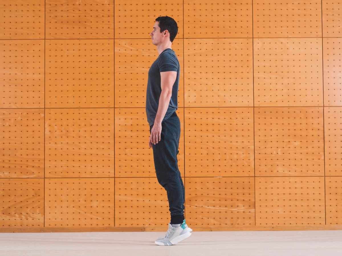 RUNNER PERFORMING RETURN-TO-RUN REHAB EXERCISE CALF RAISES