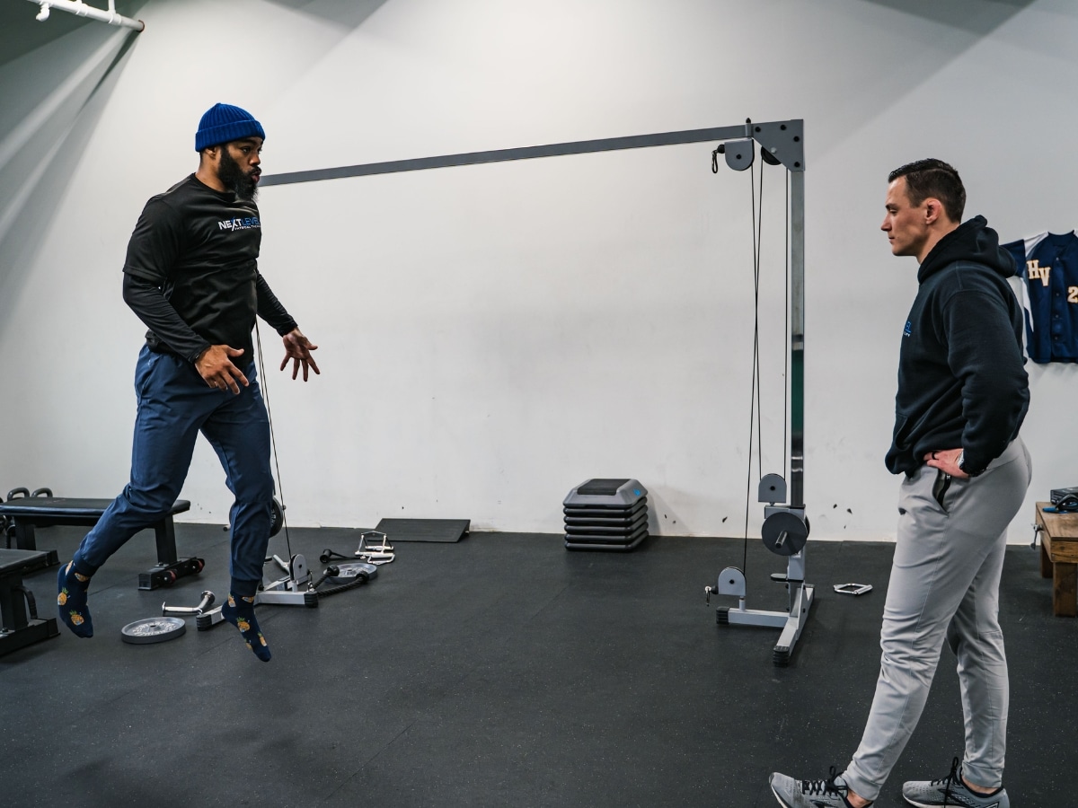 ATHLETE PERFORMING RETURN-TO-SPORT LANDING DRILL