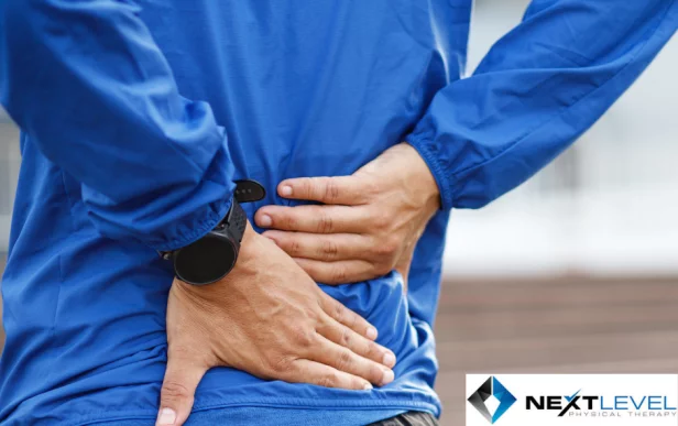 Man holding his back from sciatica pain after exercise